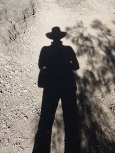 shadow hat man